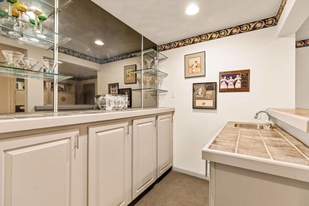 124 Damon Road Needham, MA 02494 - Photo 36 of 42 a kitchen with a sink and cabinets