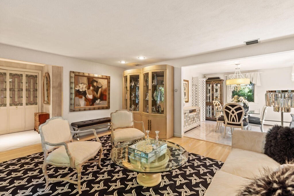 124 Damon Road Needham, MA 02494 - Photo 8 of 42 a living room with furniture and a large window