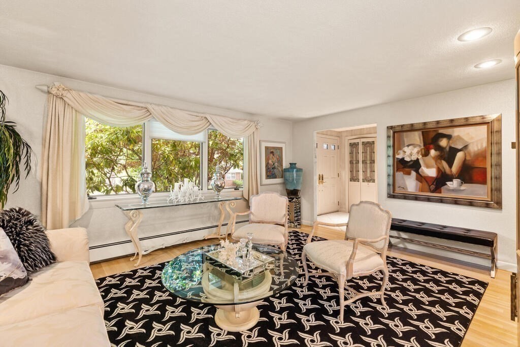 124 Damon Road Needham, MA 02494 - Photo 9 of 42 a living room with furniture and a large window