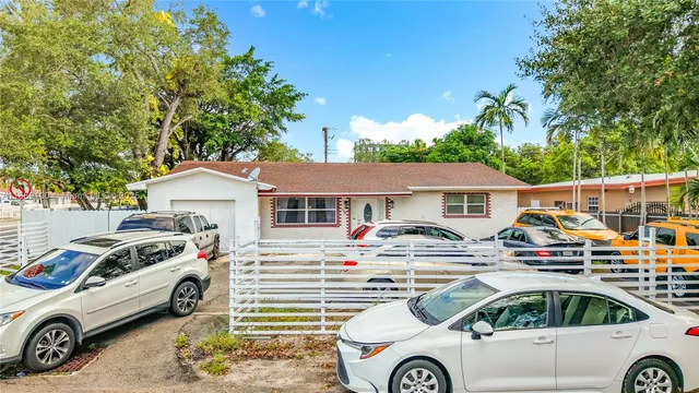 a house view with a garden space