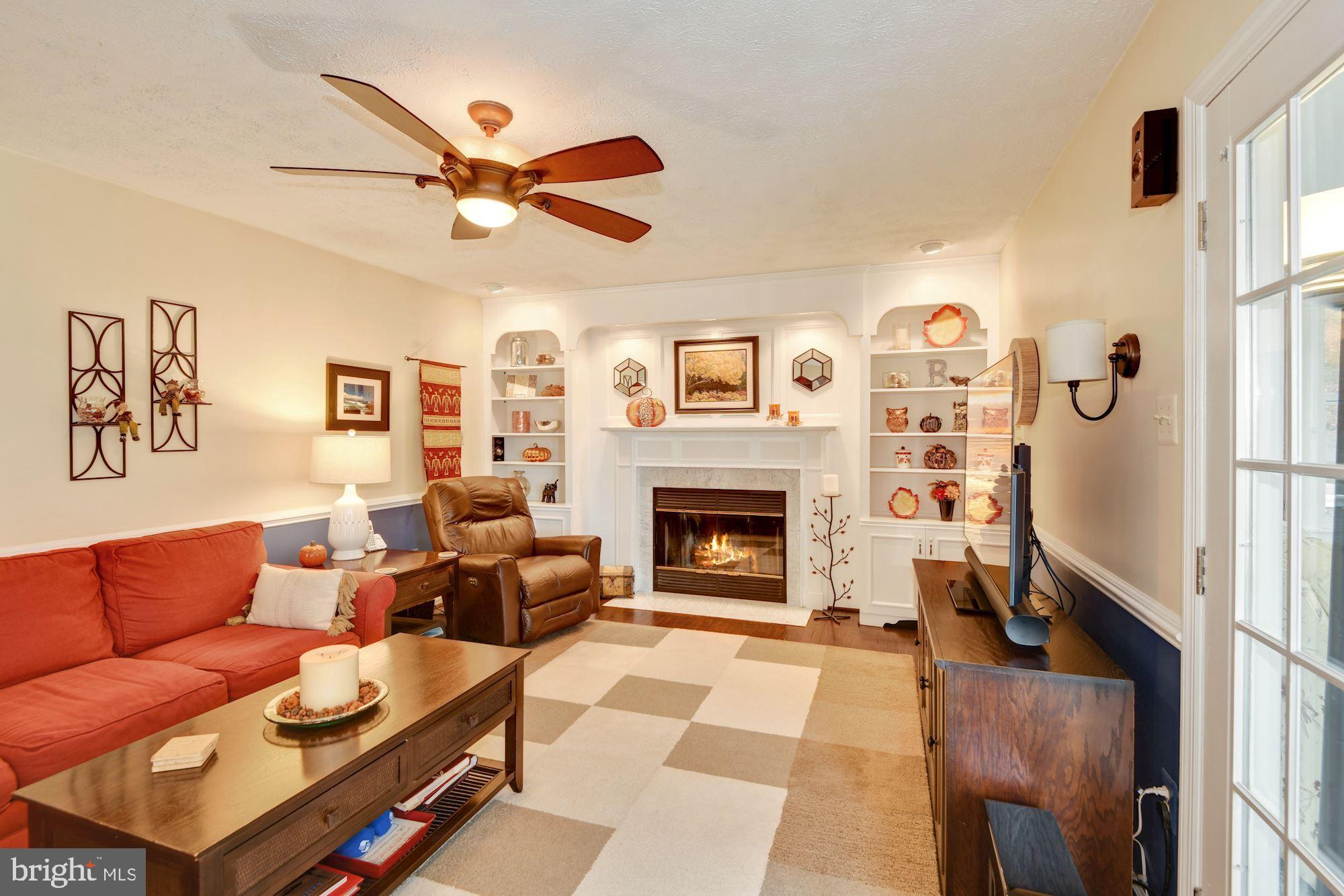 6740 Hunter Road Elkridge, MD 21075 - Photo 8 of 56 Family room w/woodburning fireplace, wood floors