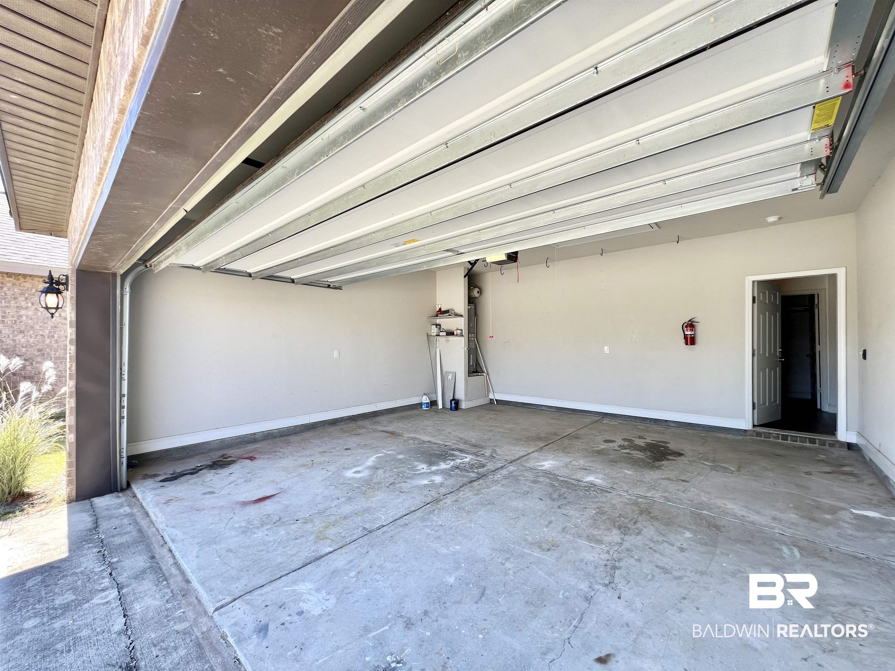 24785 Slater Mill Road Daphne, AL 36526 - Photo 34 of 46 View of garage