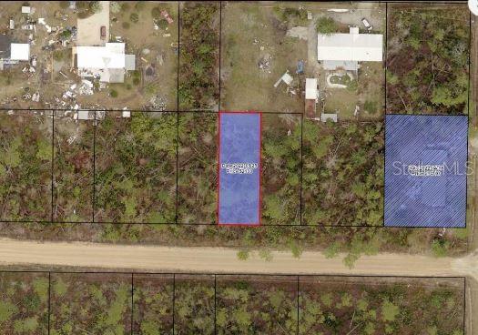 Evergreen Street Fountain, FL 32438 - Photo 2 of 6 a aerial view of a house with a yard