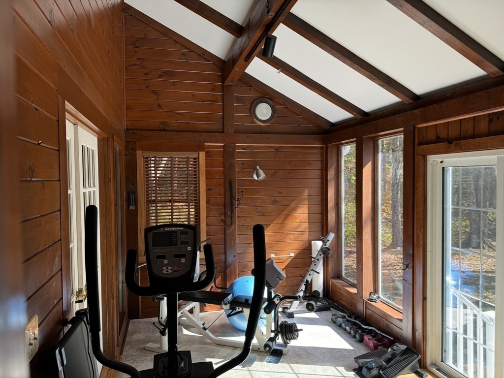 209 Gaffney Road Oakham, MA 01068 - Photo 12 of 42 a view of a room with gym equipment
