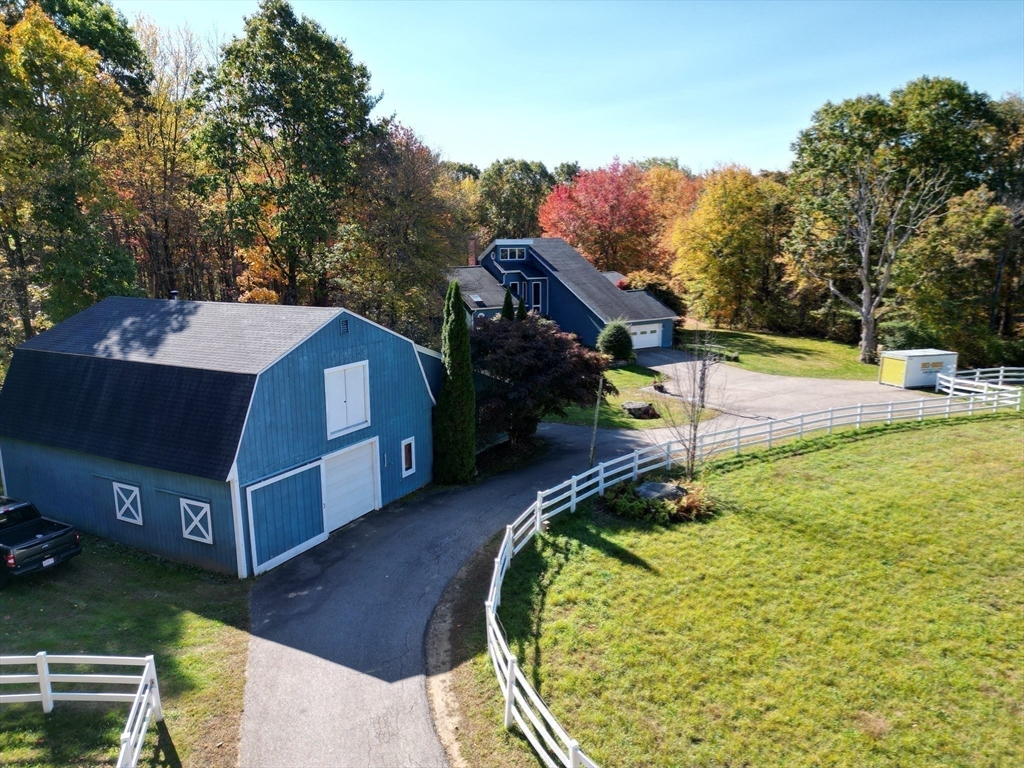 209 Gaffney Road Oakham, MA 01068 - Photo 2 of 42 a view of a backyard with swimming pool
