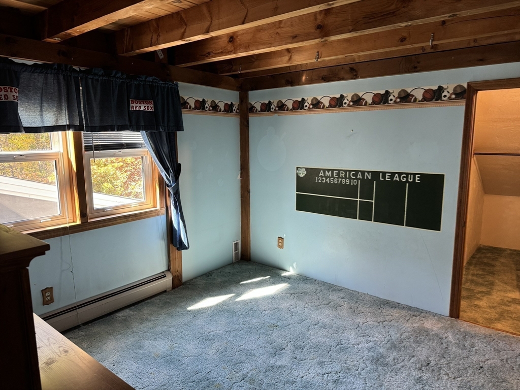 209 Gaffney Road Oakham, MA 01068 - Photo 21 of 42 a view of an empty room with a window