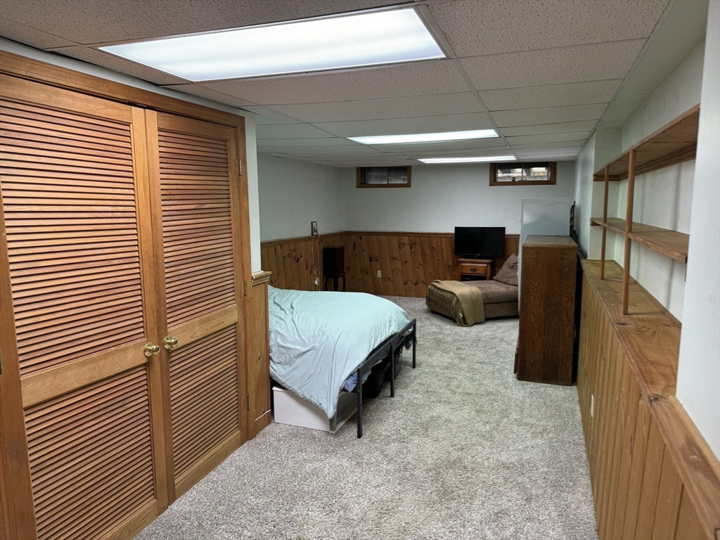 209 Gaffney Road Oakham, MA 01068 - Photo 22 of 42 a bedroom with furniture and a window