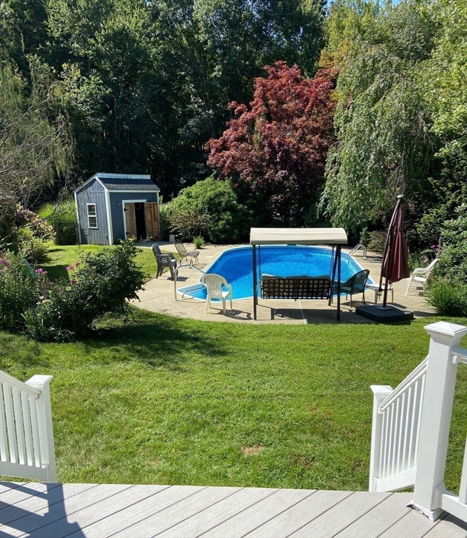 209 Gaffney Road Oakham, MA 01068 - Photo 26 of 42 a front view of a house with garden