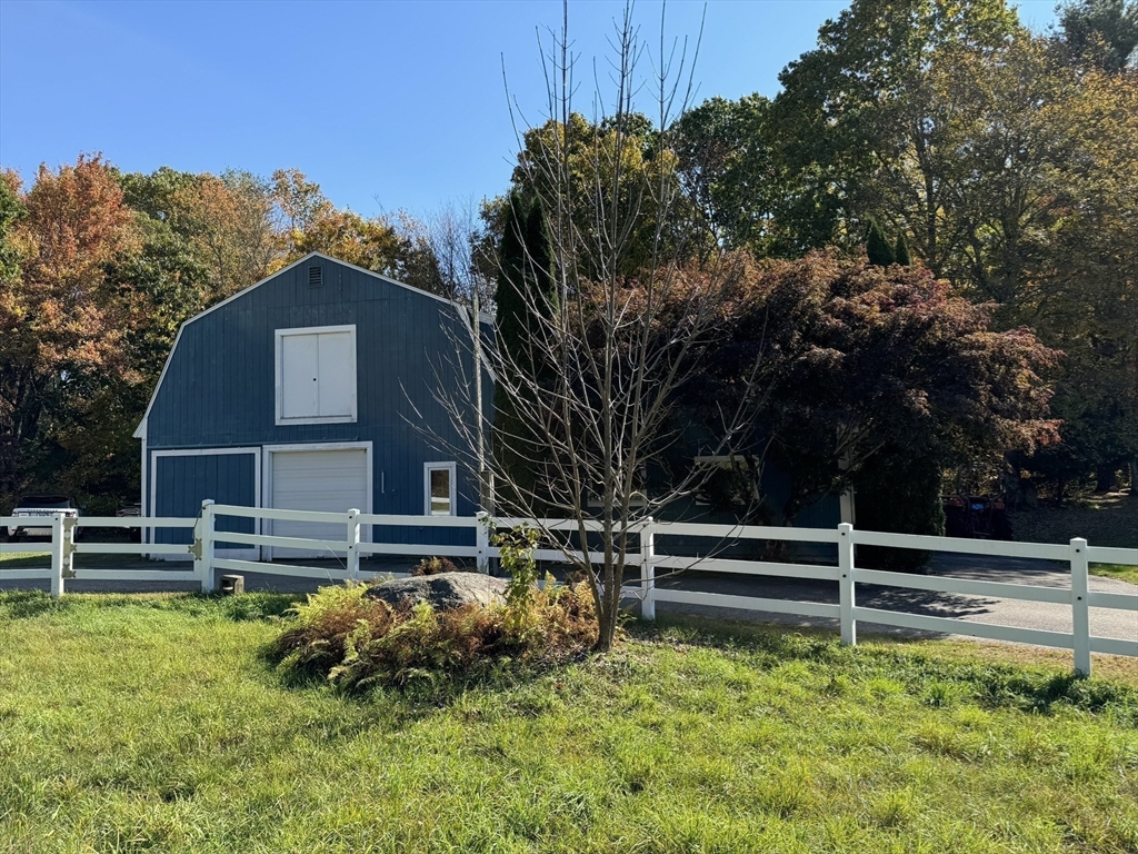 209 Gaffney Road Oakham, MA 01068 - Photo 30 of 42 a view of a house with a yard