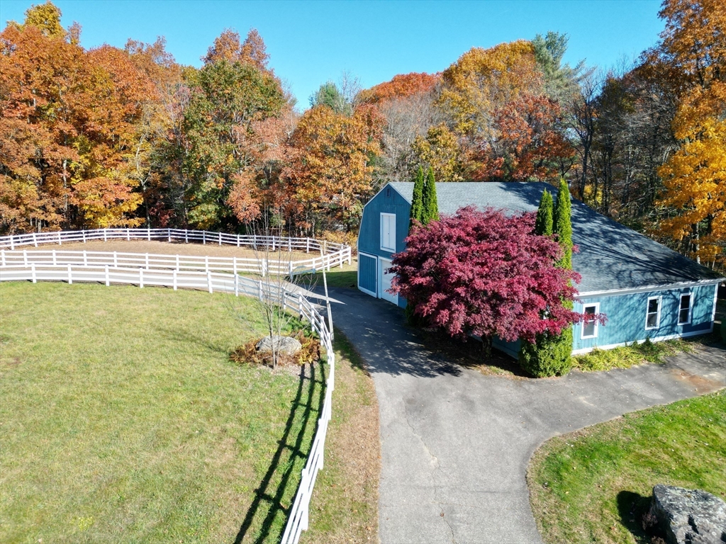 209 Gaffney Road Oakham, MA 01068 - Photo 32 of 42 a view of a backyard with a garden