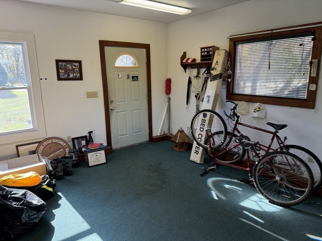 209 Gaffney Road Oakham, MA 01068 - Photo 34 of 42 a view of a room with gym equipment