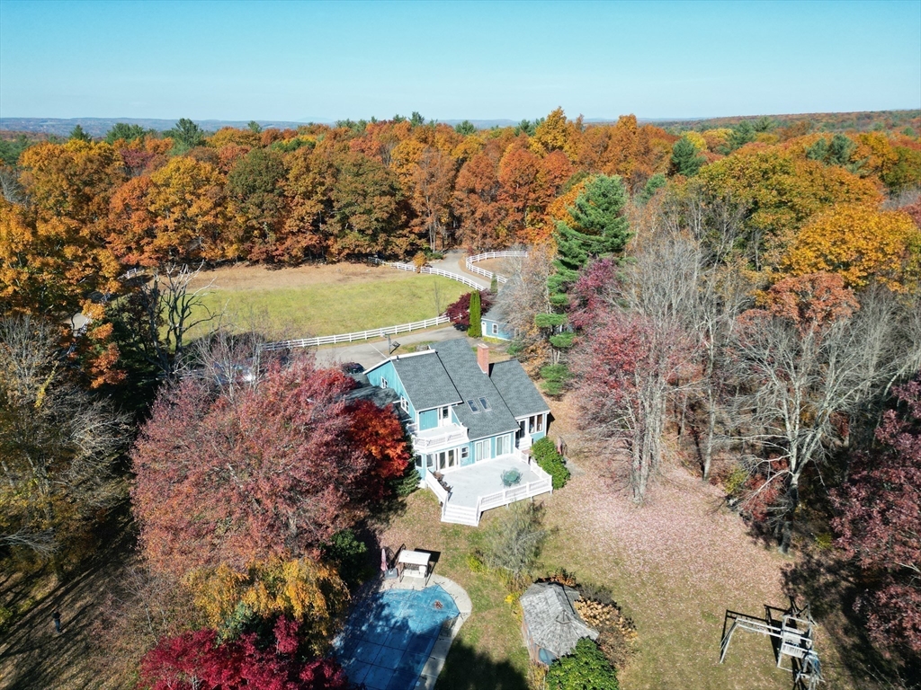 209 Gaffney Road Oakham, MA 01068 - Photo 42 of 42 an aerial view of a houses with a yard