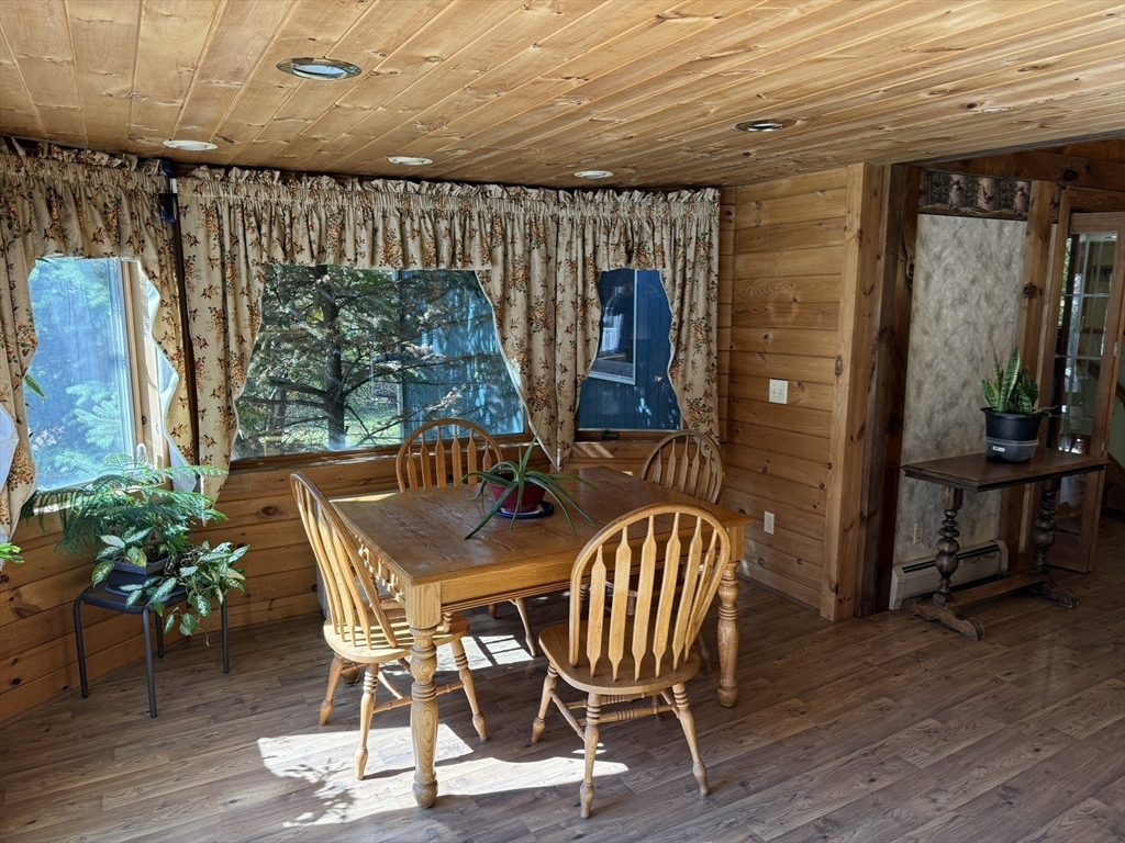 209 Gaffney Road Oakham, MA 01068 - Photo 8 of 42 a view of an outside dining space with furniture