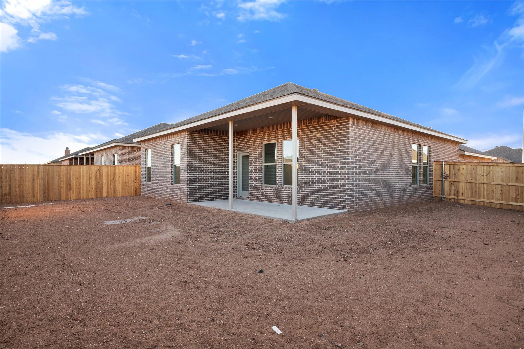 5309 Remington Avenue Lubbock, TX 79407 - Photo 21 of 22 a view of backyard of house