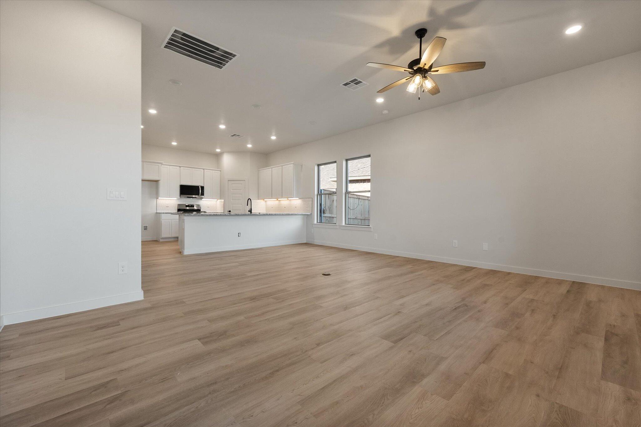 5309 Remington Avenue Lubbock, TX 79407 - Photo 10 of 22 a view of kitchen with stove and cabinets