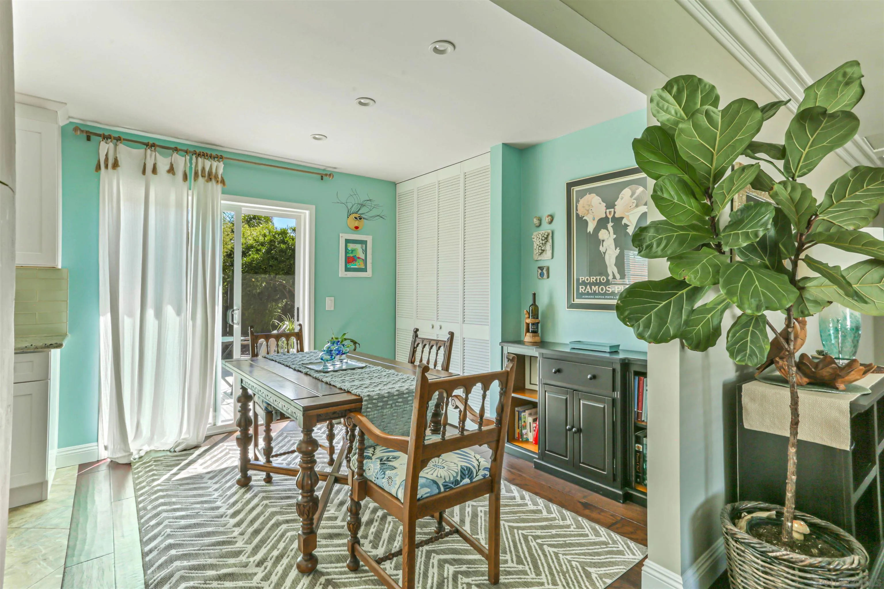 13515 Utopia Road Poway, CA 92064 - Photo 11 of 36 a dining room filled chandelier and wooden floor