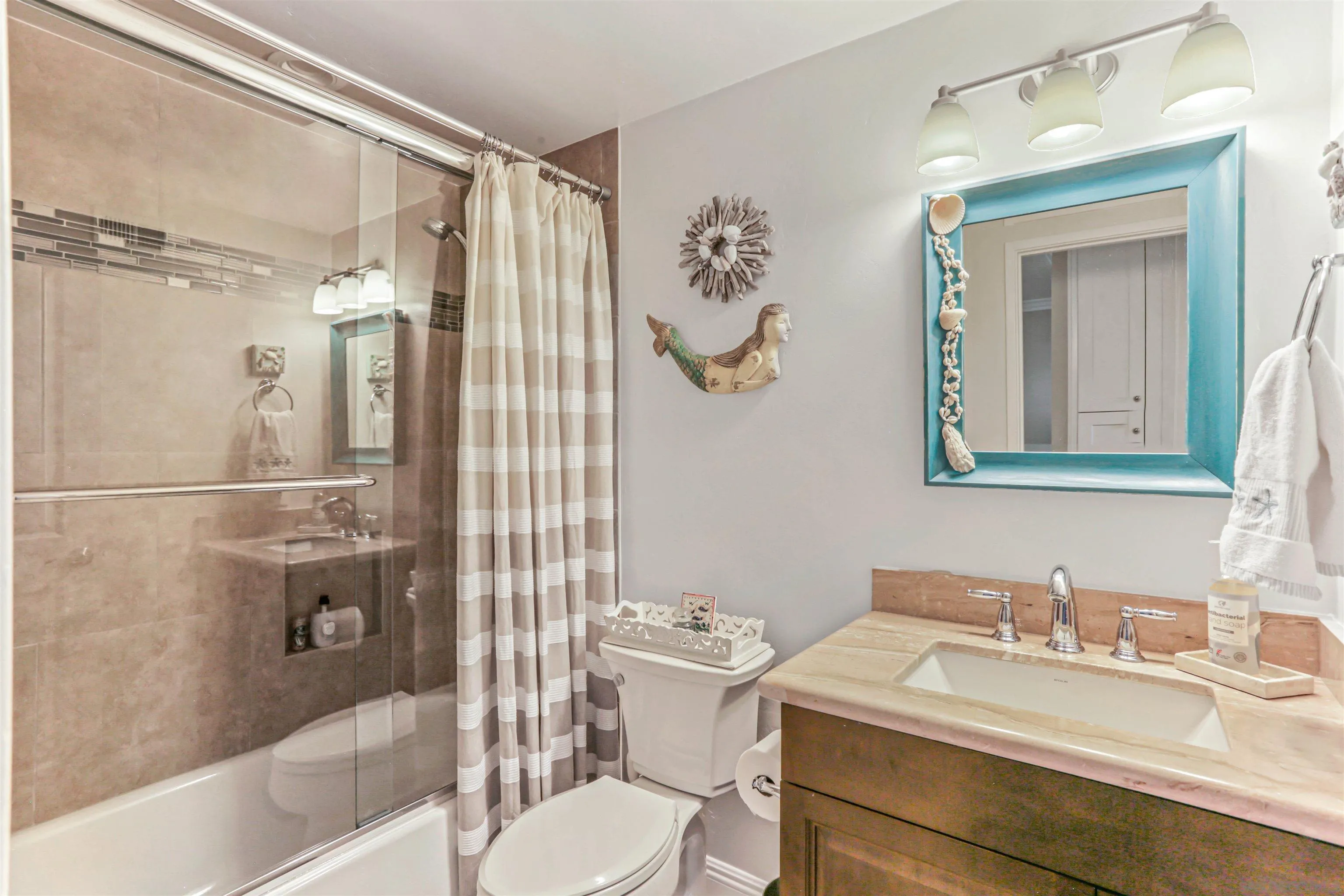 13515 Utopia Road Poway, CA 92064 - Photo 15 of 36 a bathroom with a sink vanity mirror and toilet