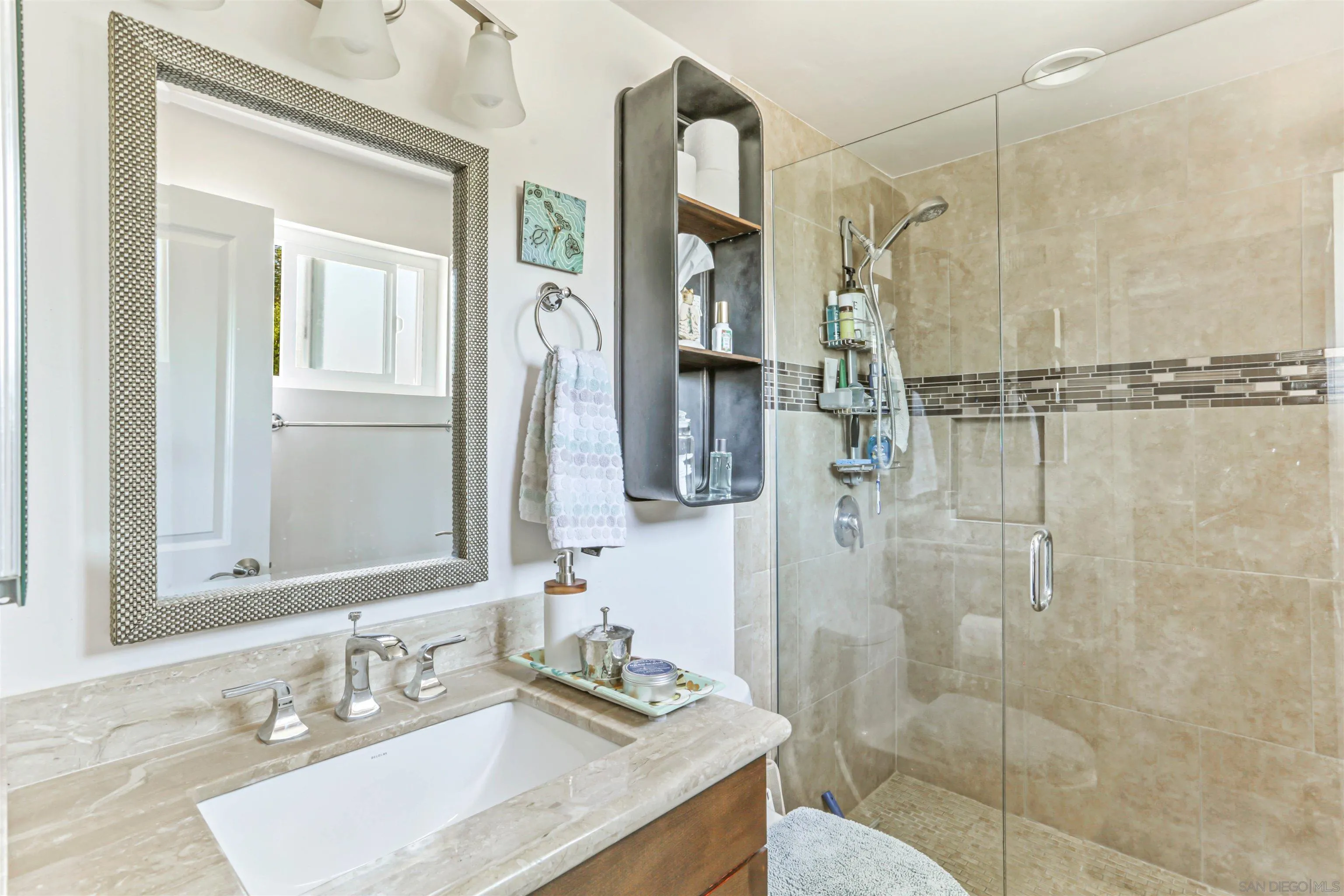 13515 Utopia Road Poway, CA 92064 - Photo 20 of 36 a bathroom with a granite countertop sink a mirror and shower