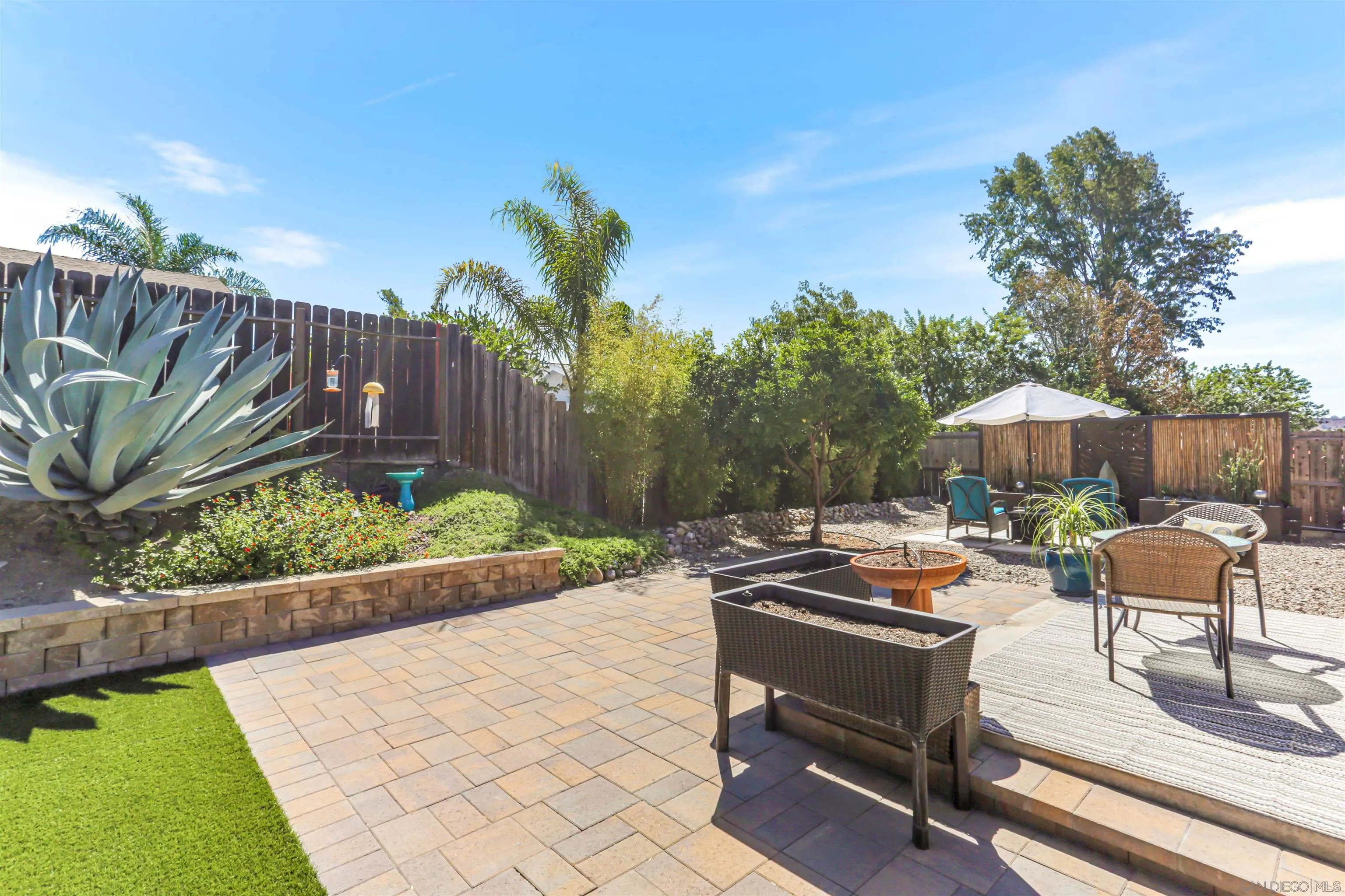 13515 Utopia Road Poway, CA 92064 - Photo 27 of 36 a view of a backyard with sitting area