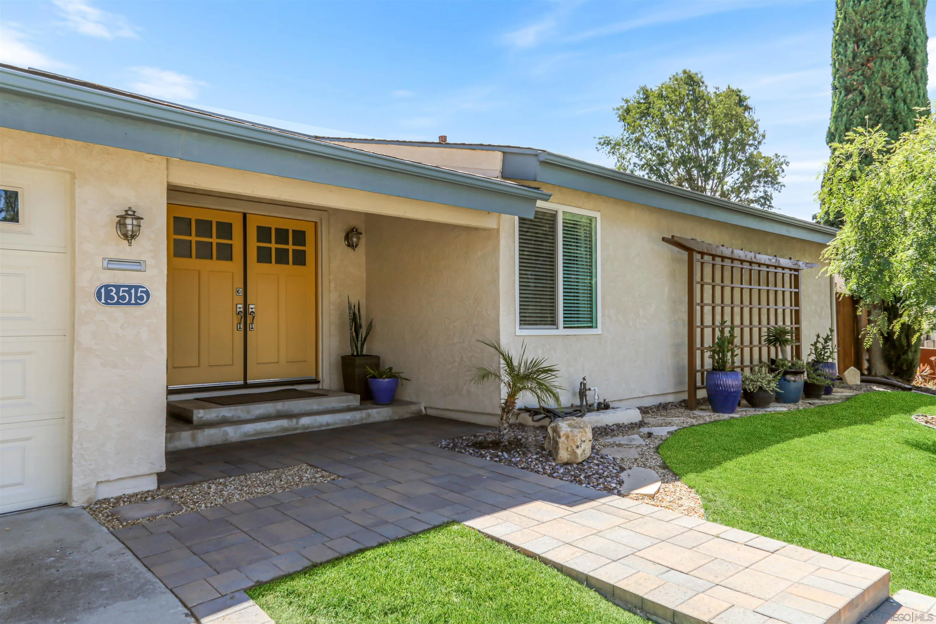 13515 Utopia Road Poway, CA 92064 - Photo 3 of 36 a front view of a house with garden
