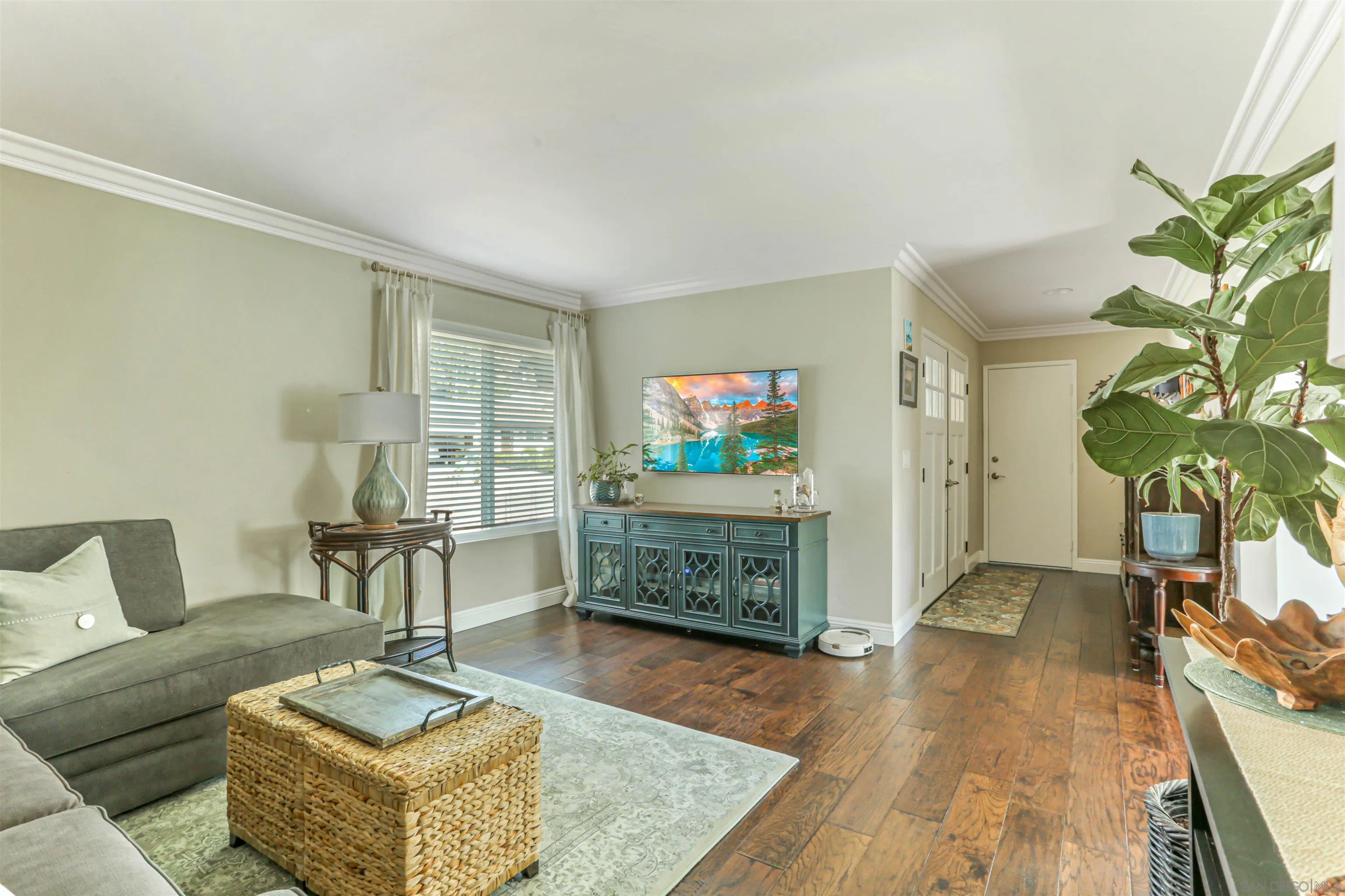 13515 Utopia Road Poway, CA 92064 - Photo 7 of 36 a living room with furniture and a flat screen tv