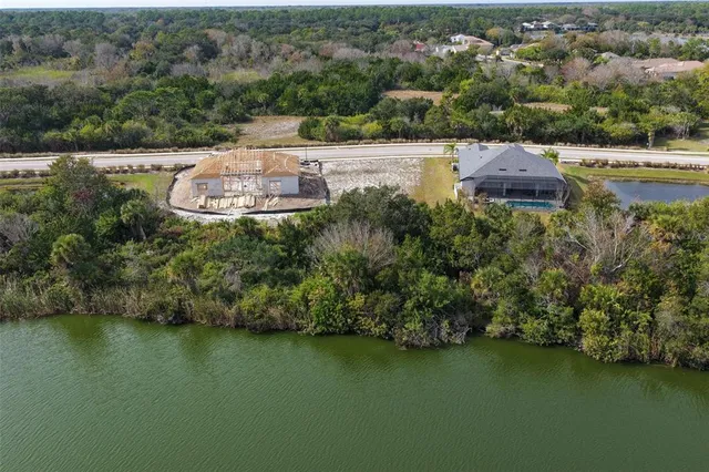 an aerial view of residential house with outdoor space