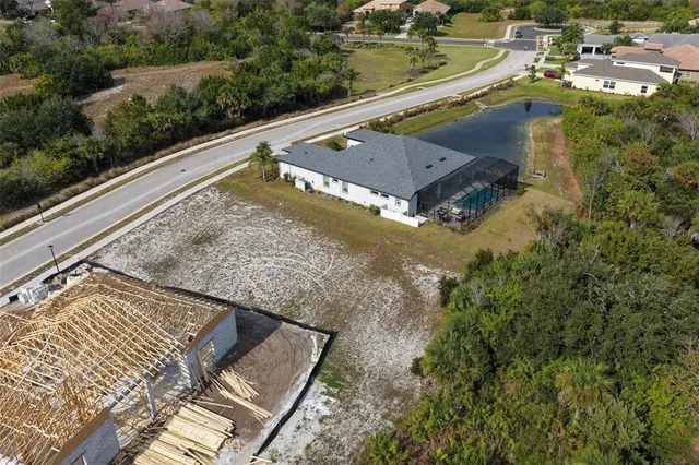 a view of a street with a yard