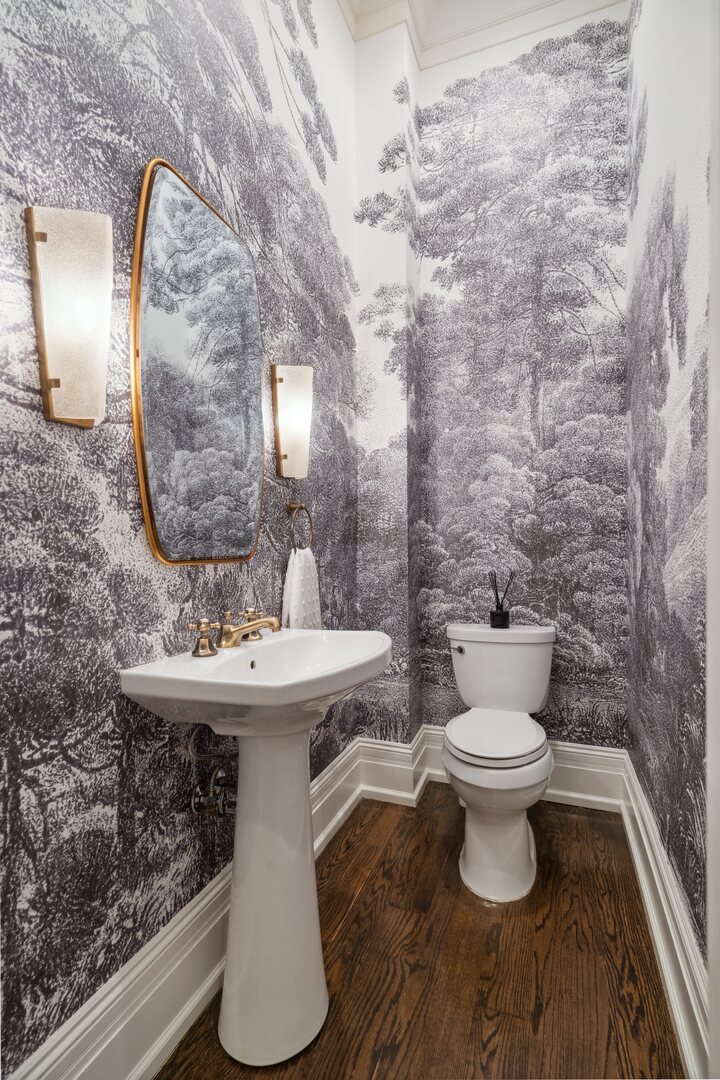 24 West Chestnut Street Chicago, IL 60610 - Photo 16 of 38 a bathroom with a toilet sink and mirror