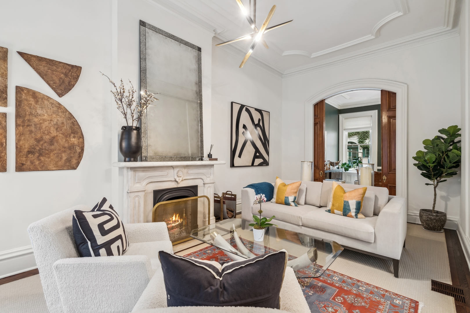 24 West Chestnut Street Chicago, IL 60610 - Photo 7 of 38 a living room with furniture and a fireplace