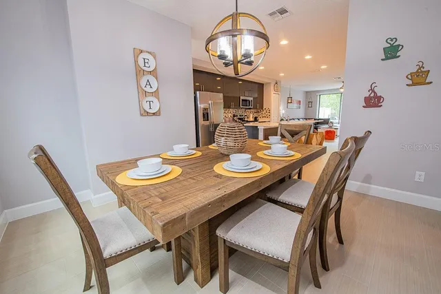 a view of a dining room with furniture