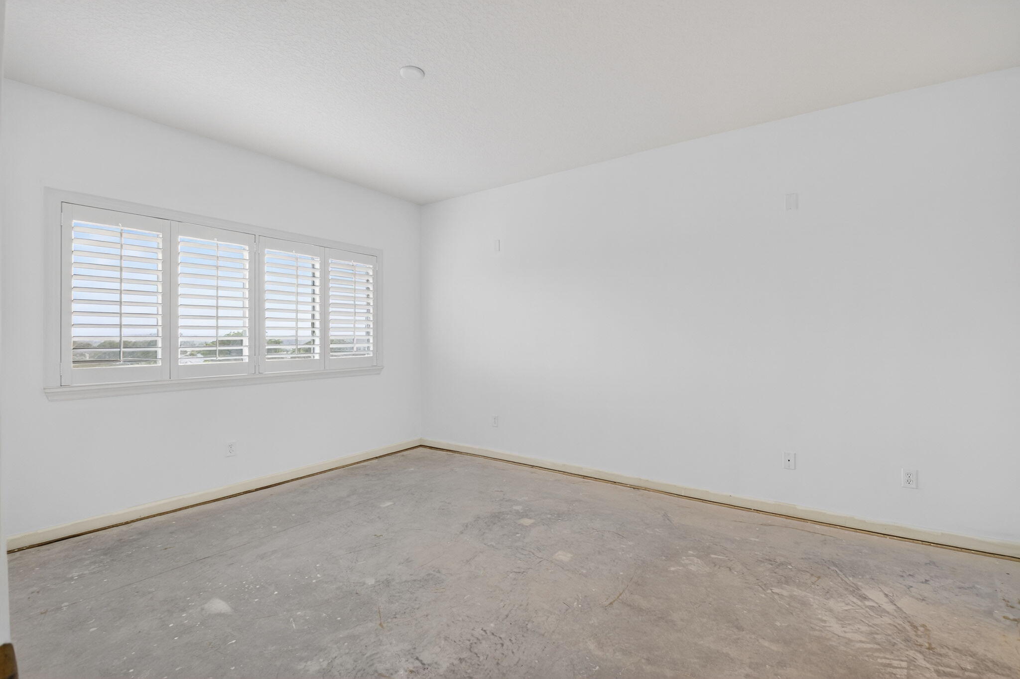 22715 Camino Del Mar, Unit 61 Boca Raton, FL 33433 - Photo 28 of 39 an empty room with a window