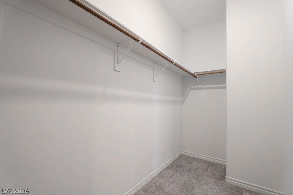 7126 Calvert Cliffs Street North Las Vegas, NV 89084 - Photo 26 of 44 Ample closet space with shelving provides convenient storage.