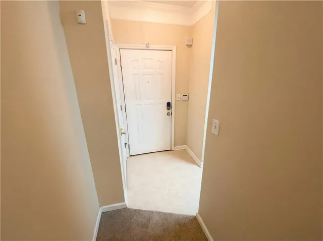 a kitchen with granite countertop a sink and a stove