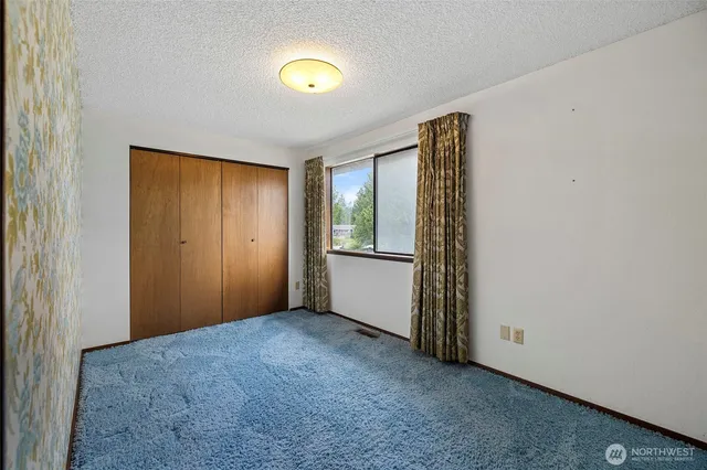 a bathroom with a sink double vanity and a shower
