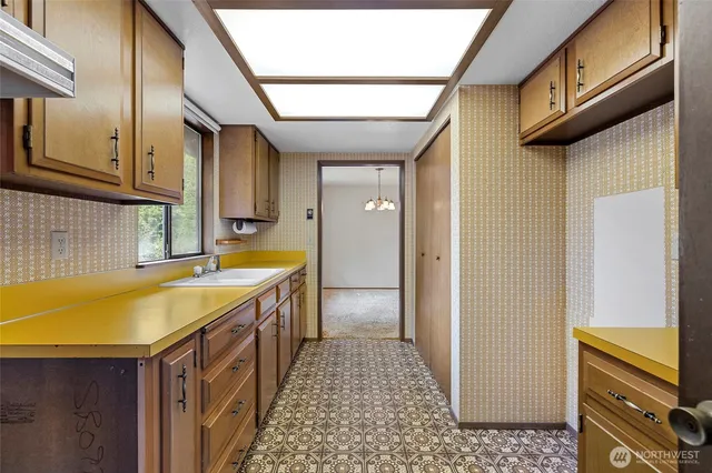 a view of a room with furniture wooden floor and window