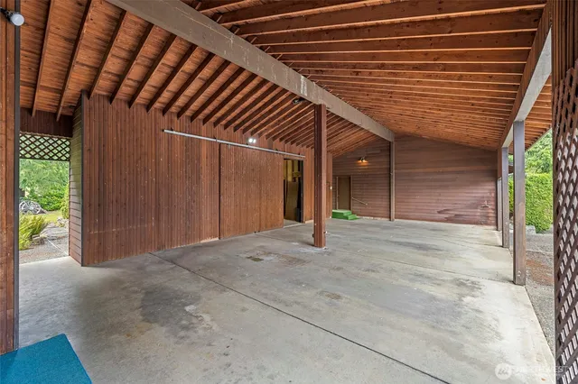a view of a porch with wooden floor