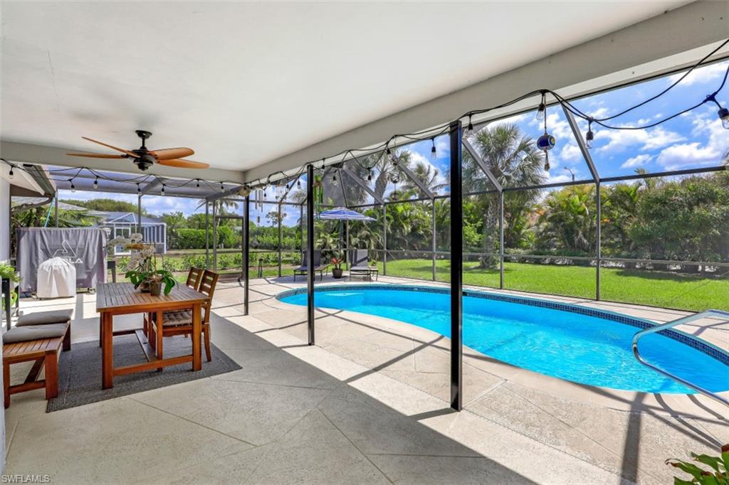 1010 Nottingham Drive Naples, FL 34109 - Photo 12 of 28 a view of a patio with a backyard
