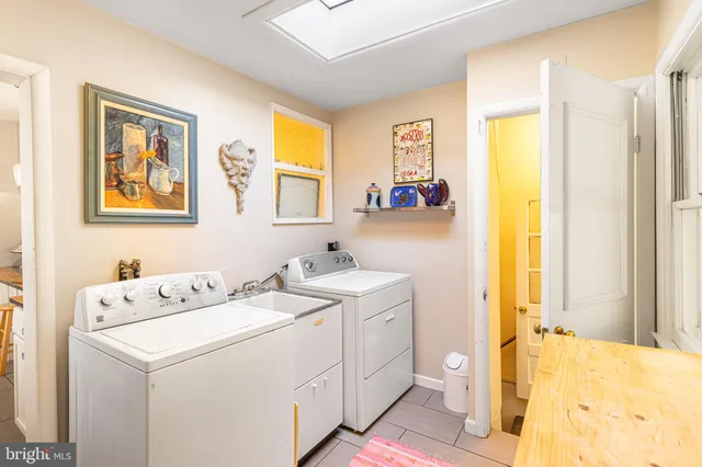 a view of bathroom with dual sinks