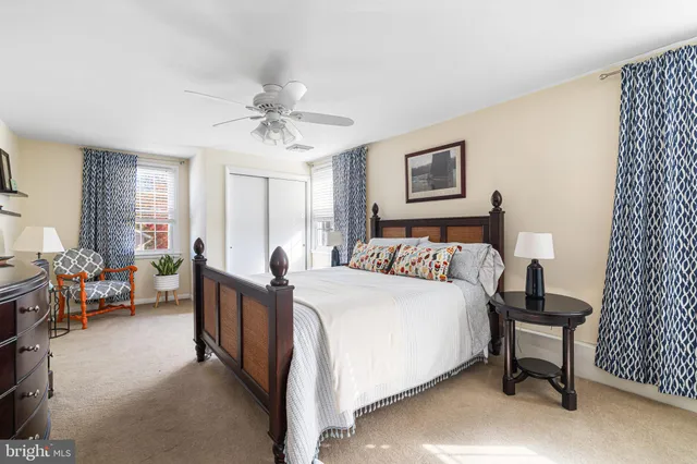 a bed room with a bed and furniture