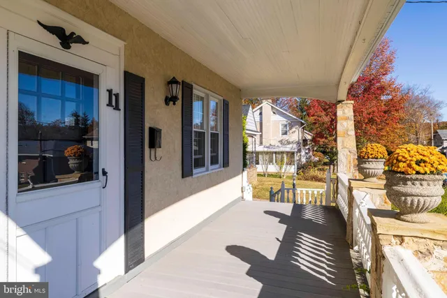 a lobby with furniture and floor to ceiling window