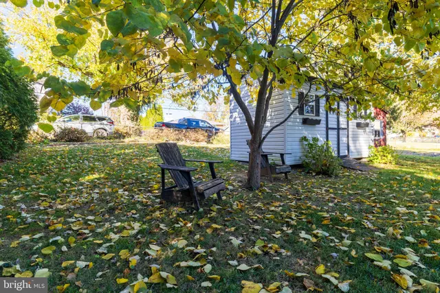 a view of a bench in a garden