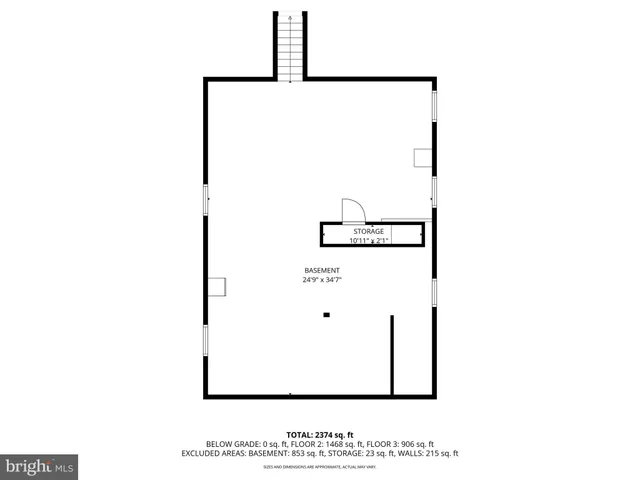 a picture of a room with refrigerator and white cabinet