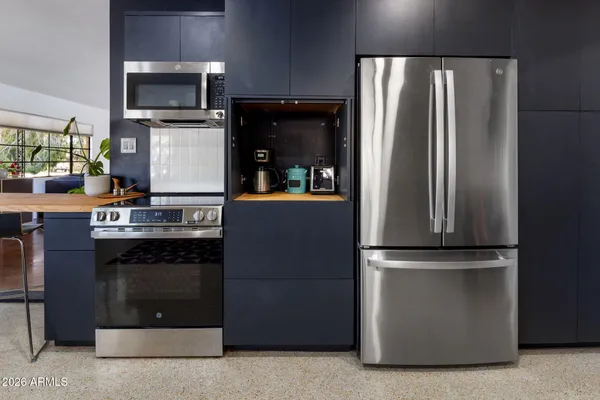 a bedroom with bed and a window