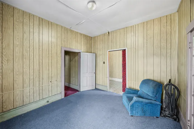 a view of livingroom with furniture and staircase