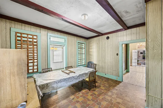 a view of a chairs and table in a patio