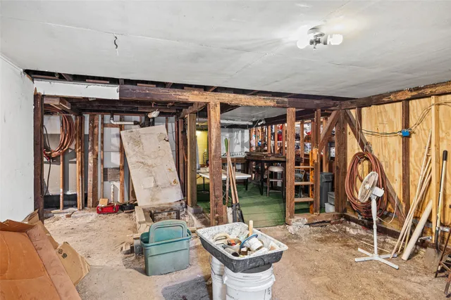 a view of a house with a swimming pool and a yard