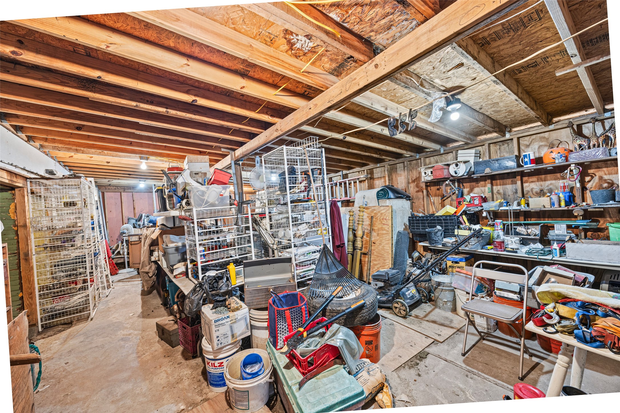 1214 Edwards Street Houston, TX 77007 - Photo 30 of 34 Discover endless possibilities with this spacious, attached workshop, perfect for all your creative and practical projects right at home.