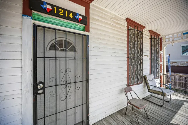 a view of a hallway with a chandelier