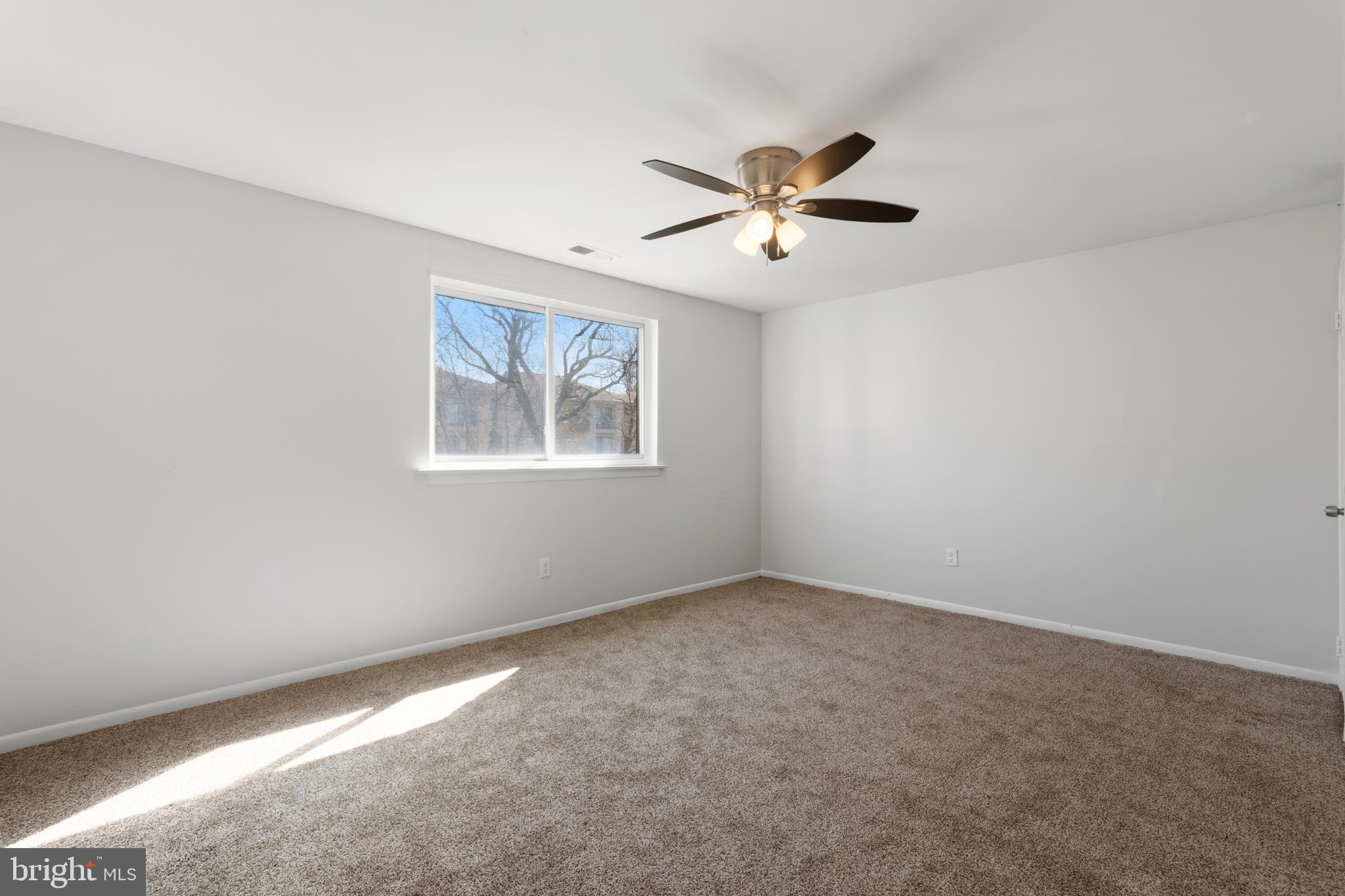 8030 Ditman Street, Unit 40G Philadelphia, PA 19136 - Photo 13 of 16 a view of an empty room with a window