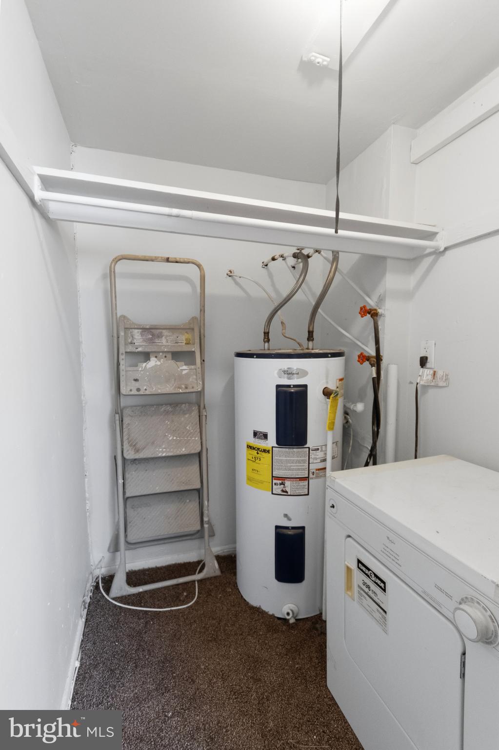 8030 Ditman Street, Unit 40G Philadelphia, PA 19136 - Photo 16 of 16 a utility room with dryer and washer